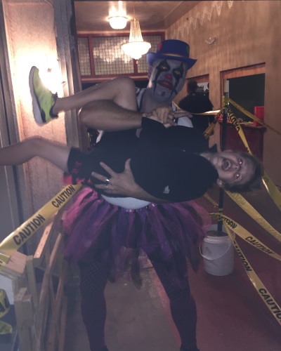 creepy father and daughter at haunted house